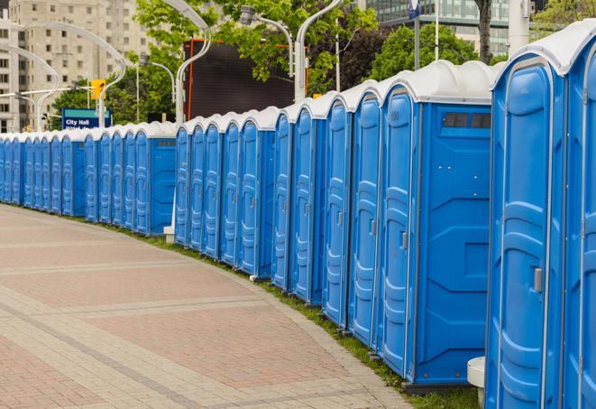 a row of portable restrooms at a trade show, catering to visitors with a professional and comfortable experience in Bartonville